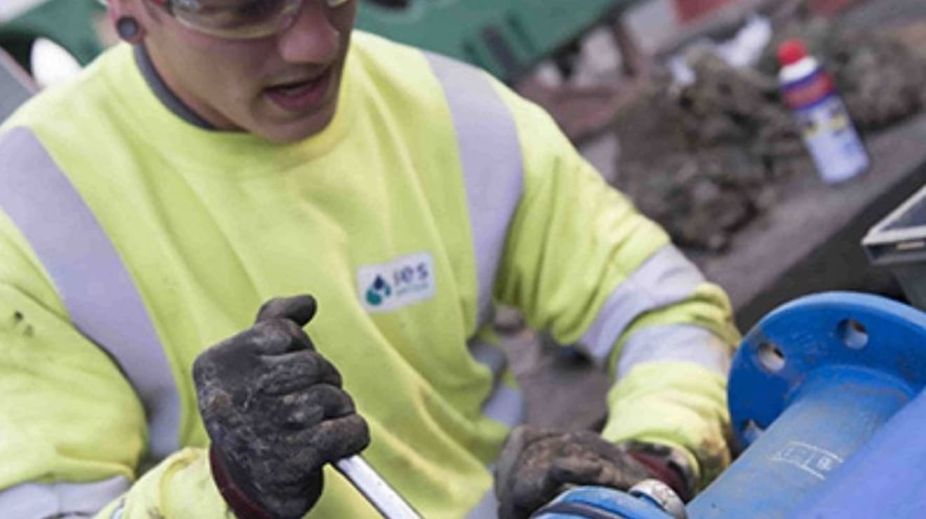 SES engineer connecting water pipes to regulations